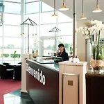 Отель Courtyard By Marriott Magdeburg